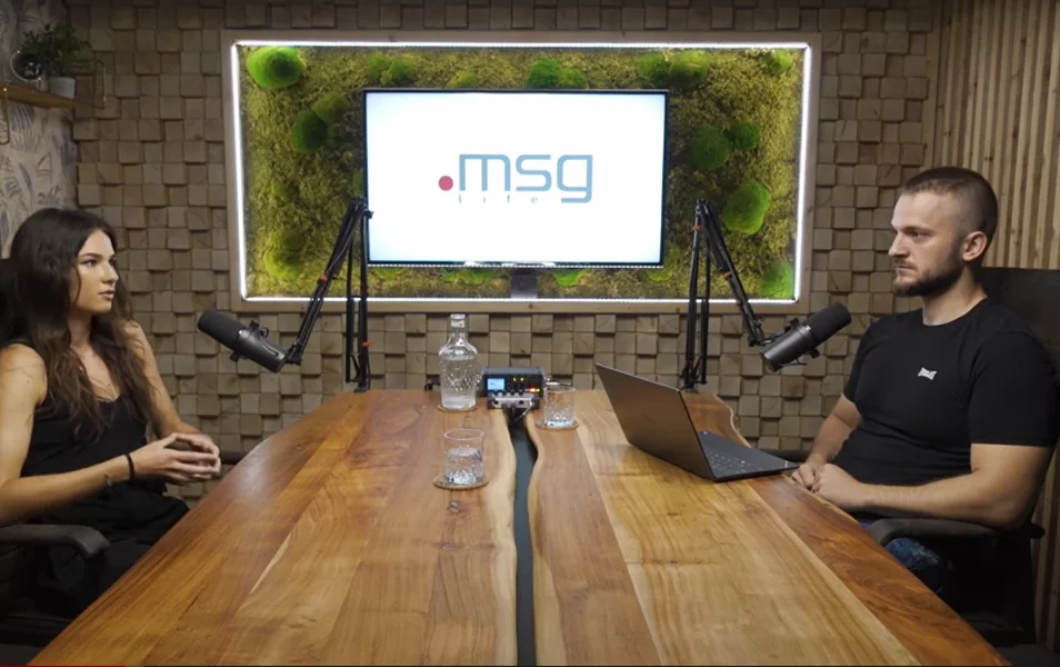IT tester Xenia and Michal Hucko talk in the studio while recording a podcast